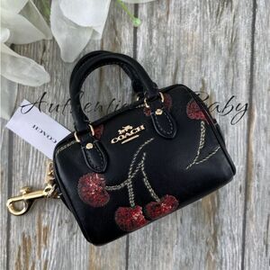 Authentic Coach Mini Rowan Bag Charm In Black Cherry Print Purse Wallet Leather